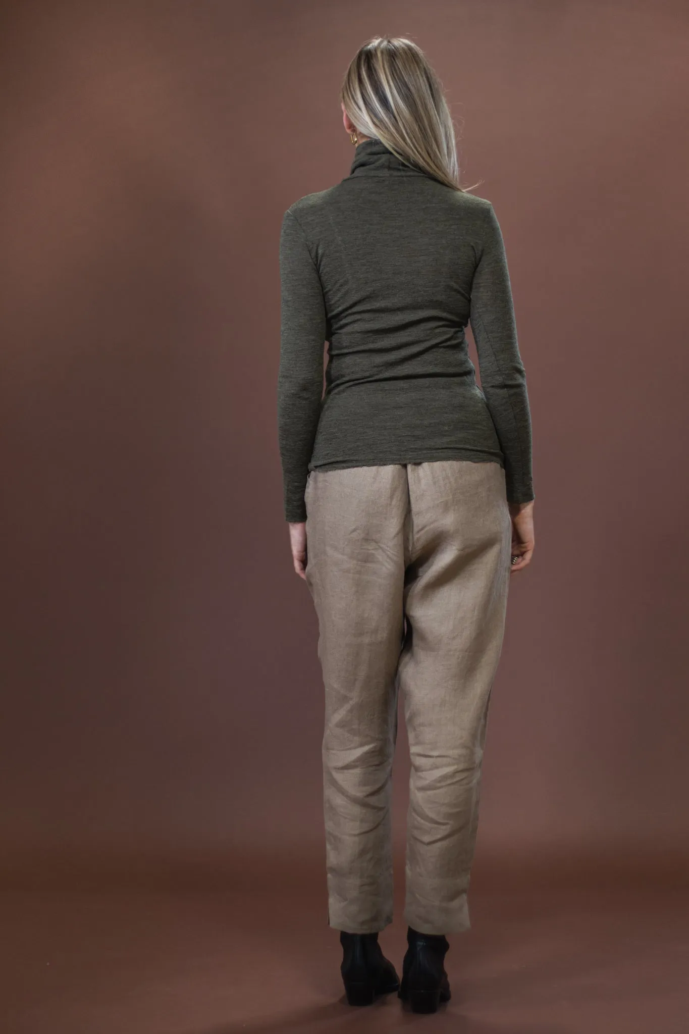 Static Reducing Finish Merino Roll Neck | Capers Melange